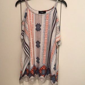 Open shoulder flowy blouse.